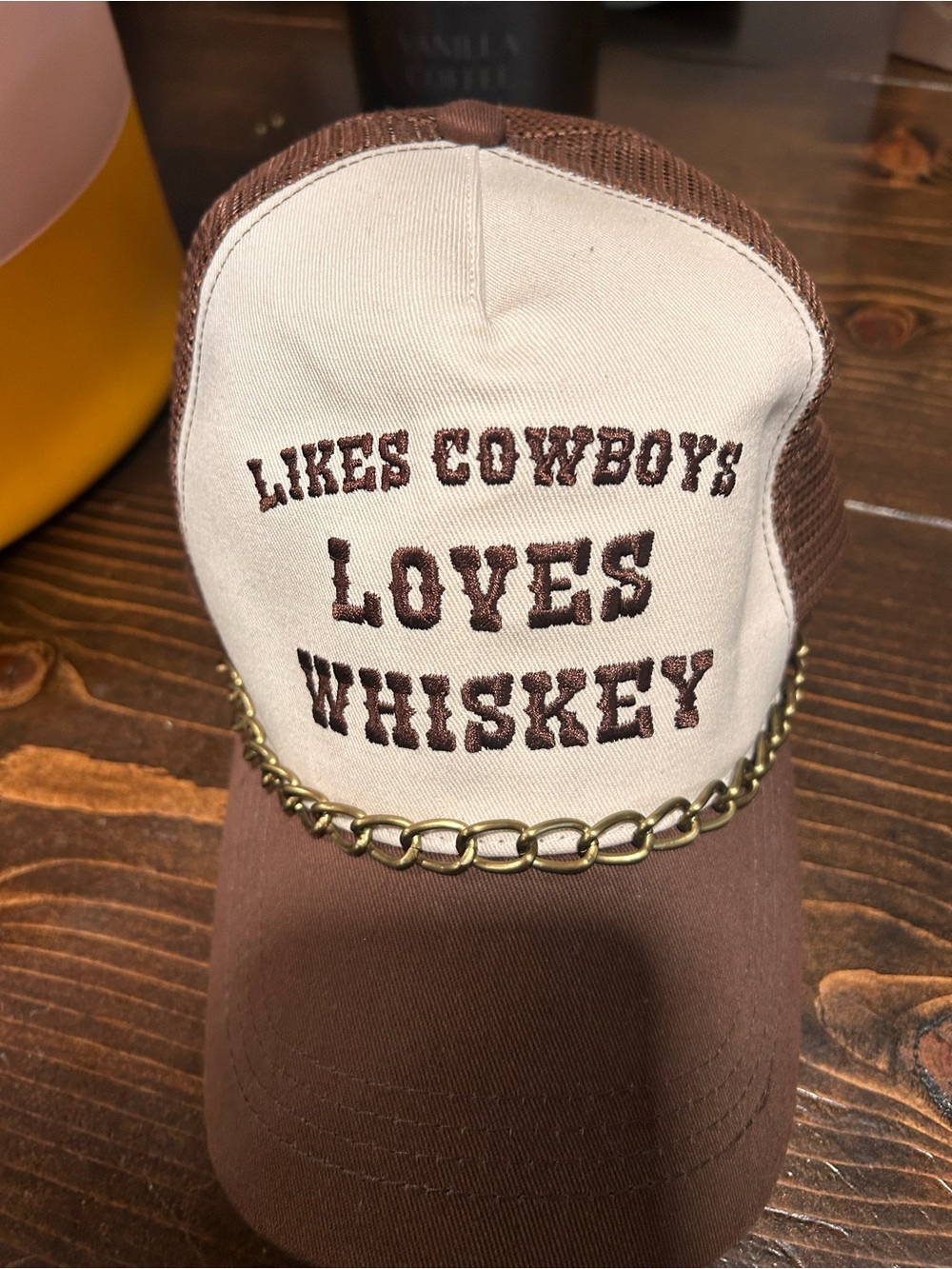 ‘Likes Cowboys Loves Whiskey' Chain Trucker Hat